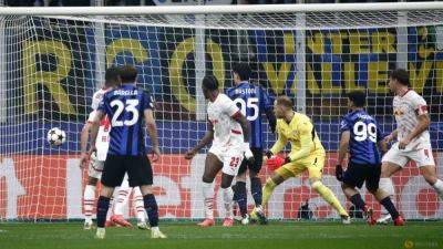 Leipzig own goal sends Inter top of Champions League