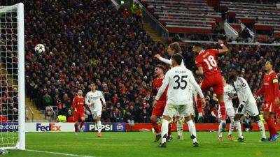 Andy Robertson - Alexis Mac-Allister - Cody Gakpo - Arne Slot - Conor Bradley - Dominant Liverpool beat Real Madrid 2-0 to top Champions League - channelnewsasia.com - county Bradley
