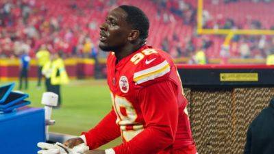 Football-Chiefs' Wharton says catching child falling from stands was a natural reaction