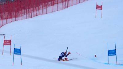 Mikaela Shiffrin tumbles into fencing during final run - ESPN