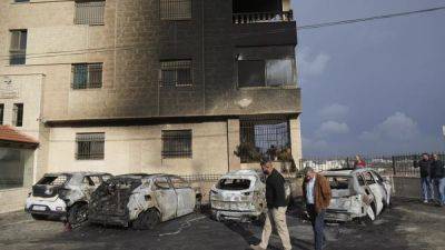 Palestinian officials accuse Israeli settlers of overnight arson attack in the occupied West Bank