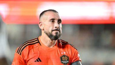Houston Dynamo's Herrera sent off after spitting near referee