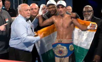 Roy Jones-Junior - Indian Boxer Mandeep Jangra Wins WBF's World Title - sports.ndtv.com - Britain - India - county Mcintosh