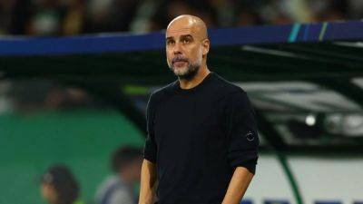 Ruben Dias - Jack Grealish - Pep Guardiola - John Stones - Guardiola relishing the challenge of getting City back on track - channelnewsasia.com