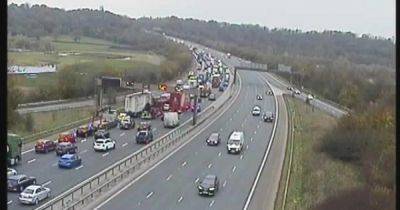 M6 closed LIVE updates as air ambulance lands after lorry overturns