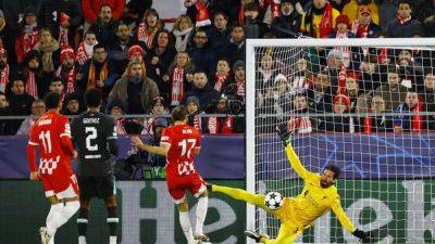 Slot sings Alisson's praises after returning keeper helps Liverpool to Girona win