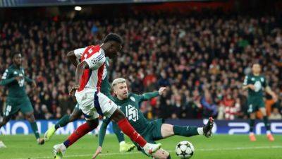Saka double eases Arsenal past Monaco