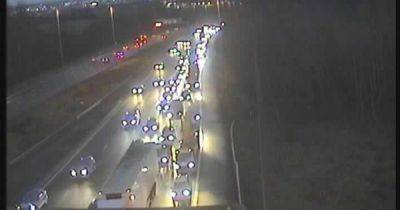 M60 crash LIVE traffic updates with long delays and two lanes shut