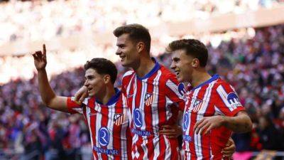 Alexander Sorloth - Nahuel Molina - David Soria - Sorloth's header maintains Atletico's winning run in victory against Getafe - channelnewsasia.com