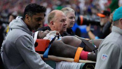 Dolphins' Grant DuBose stretchered off after hit, goes to hospital - ESPN
