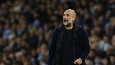 City's Guardiola shoulders the blame after shock collapse against United