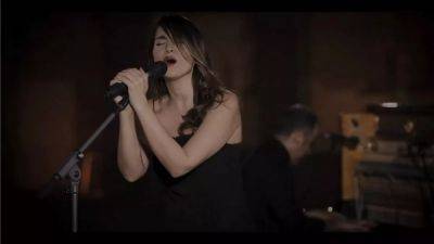 Iranian singer arrested after performing concert without hijab
