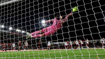 Bournemouth's Unal rescues point with superb strike against West Ham
