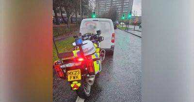 Driver 'nearly crashes' into police motorbike - then cops realise who it is - manchestereveningnews.co.uk