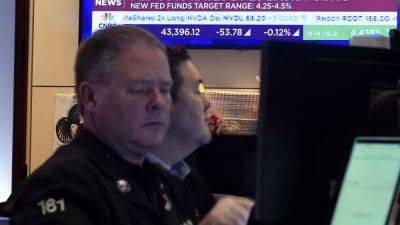 Euro tumbles to a two-year low following Fed's hawkish rate cut