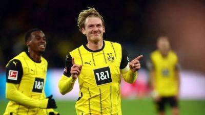 Dortmund boosted by Brandt and Anton return for Wolfsburg trip