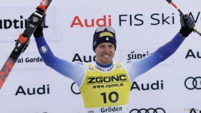 Alpine skiing-Italian Casse earns first Super-G win by a whisker