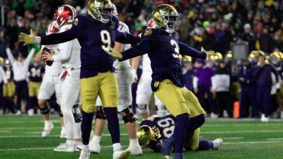 Marcus Freeman - Notre Dame beats Indiana in first game of expanded CFP - ESPN - espn.com - Ireland - state Indiana