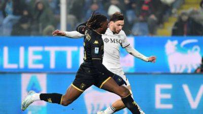 Napoli edge Genoa 2-1 to return to Serie A summit