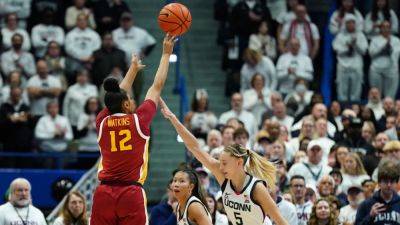 JuJu Watkins stars as USC holds off Paige Bueckers, UConn - ESPN