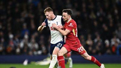 Scintillating Liverpool rout Spurs 6-3 to extend lead at top