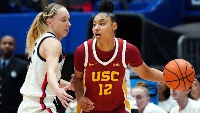 USC women get 1st ever win vs. UConn, jump to 4th in AP poll - ESPN