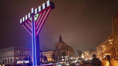 The Jewish festival of lights, Hanukkah, celebrated in Europe in a rare coincidence with Christmas