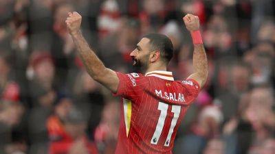 Liverpool fight back to beat Leicester and push clear at top of table