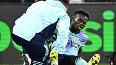 Arsenal's Saka out for more than two months after hamstring surgery