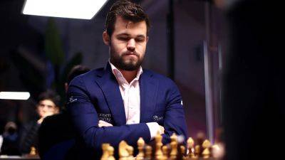 Chess great walks out of tournament over jeans row