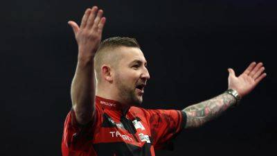 Nathan Aspinall strolls into World Championship quarter-finals