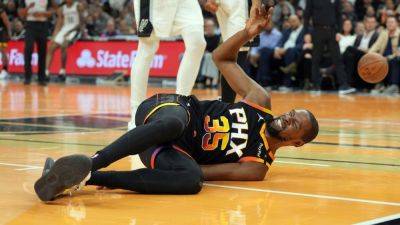 Sources - Kevin Durant out at least 1 week with ankle sprain - ESPN