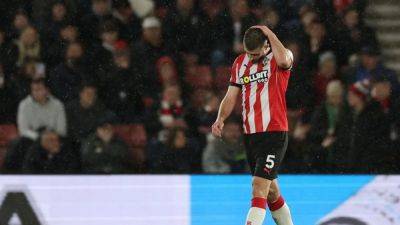 Cristian Romero - Jack Stephens - Southampton's Stephens sent off for pulling Cucurella's hair - channelnewsasia.com