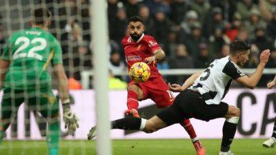 Caoimhin Kelleher - Fabian Schar - William Saliba - Ruben Amorim - Williams - Liverpool held by Newcastle in thriller, Arsenal and Chelsea close gap - channelnewsasia.com