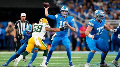 Jared Goff - Christian Watson - Josh Jacobs - Jahmyr Gibbs - Ford Field - David Montgomery - Lions retain control of NFC North with late victory over Packers - ESPN - espn.com - county Bay