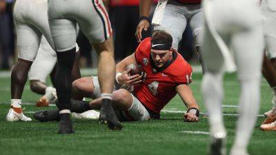 Kirby Smart - Georgia's Gunner Stockton takes huge hit in SEC title game, helmet flies off - foxnews.com - Georgia - state Oregon - state Texas