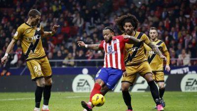 Last-gasp Depay strike earns Atletico 2-1 win over Rayo