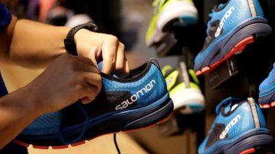 Amer Sports prices IPO below range at $13 per share-source - channelnewsasia.com - China - New York