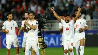 Iran dump Syria out of Asian Cup on penalties to set up quarter-final with Japan - channelnewsasia.com - Japan - Iran - Syria