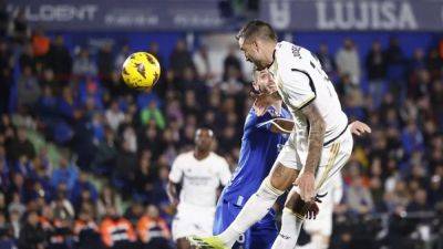 Real Madrid reclaim top spot as Joselu seals win at Getafe