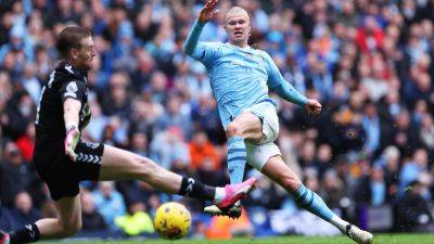 Haaland double helps City see off stubborn Everton