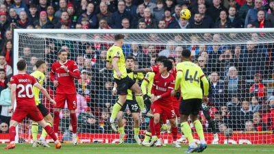 O'Shea on the mark for Burnley in Anfield defeat