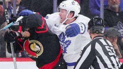 Claude Giroux - John Tavares - Sheldon Keefe - Morgan Rielly - Leafs' Rielly cross-checks Senators' Greig after empty-netter - ESPN - espn.com - Canada - county Ontario