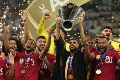 Jordan v Qatar: Akram Afif's hat-trick of penalties fires hosts to Asian Cup glory