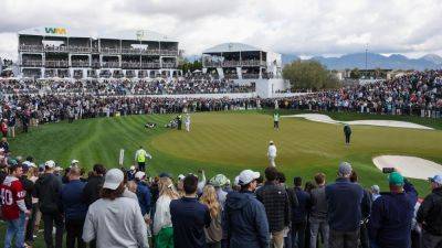 Third round at Phoenix Open suspended as Taylor leads the way