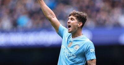 'Never say never' - John Stones disagrees with Pep Guardiola over Man City treble chances