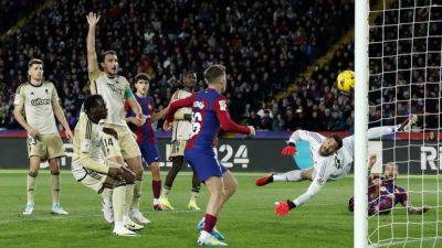 Yamal scores twice as Barcelona are held to a 3-3 draw by lowly Granada