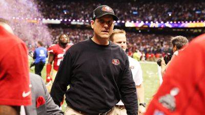 Former 49ers coach Jim Harbaugh admits Super Bowl loss still 'haunts' him but 'motivates' him every day