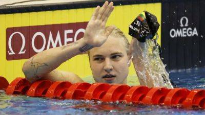 Defending champion Meilutyte crashes out of 100m breaststroke