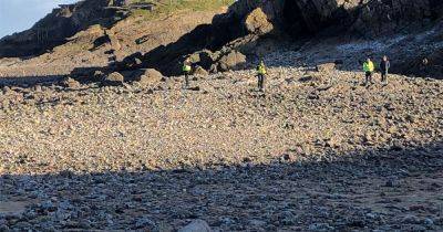 Live updates as explosive device closes part of Welsh beach